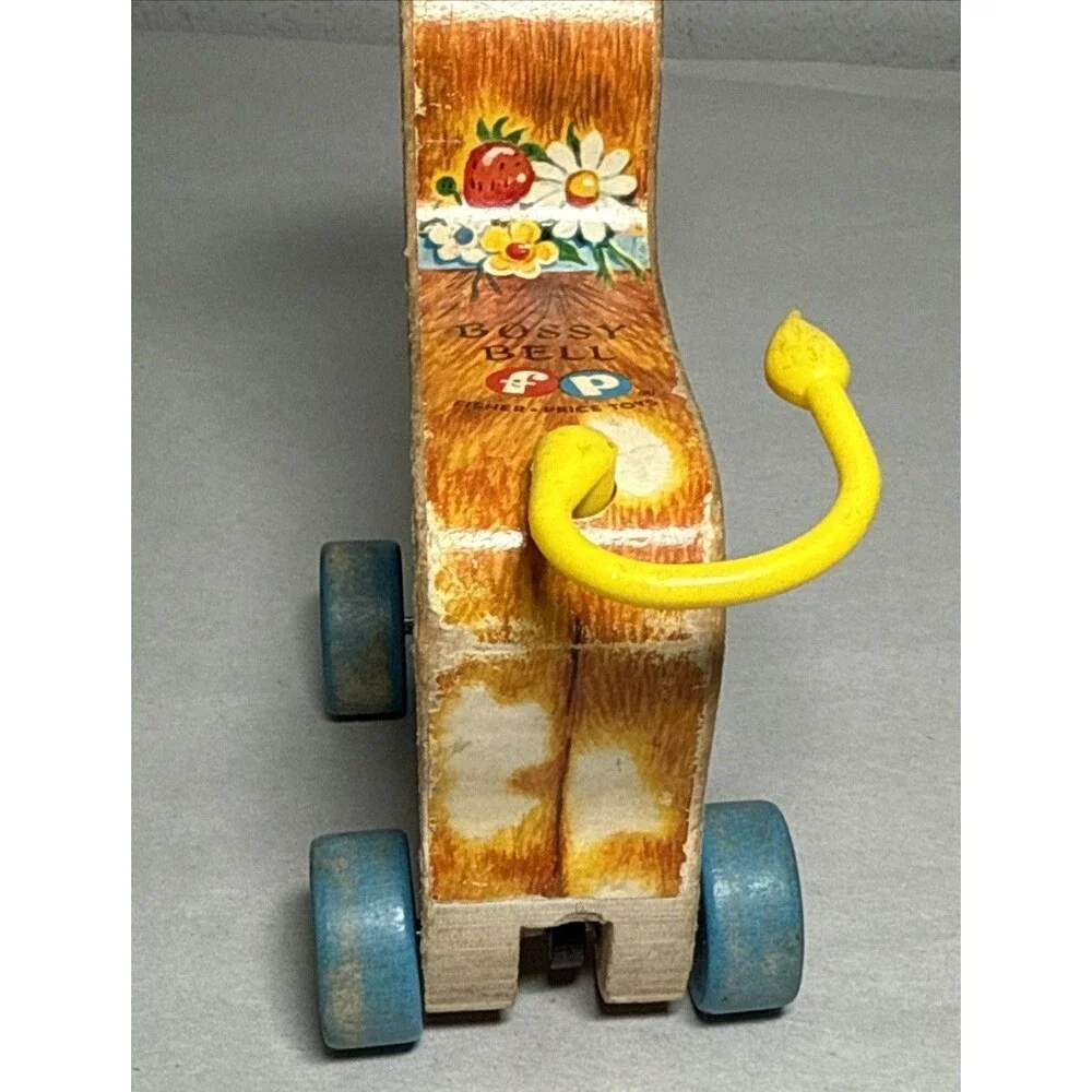 Fisher Price Vintage 1960s Bossy Bell Wooden Cow Pull Toy Tail Spins Cow Bell